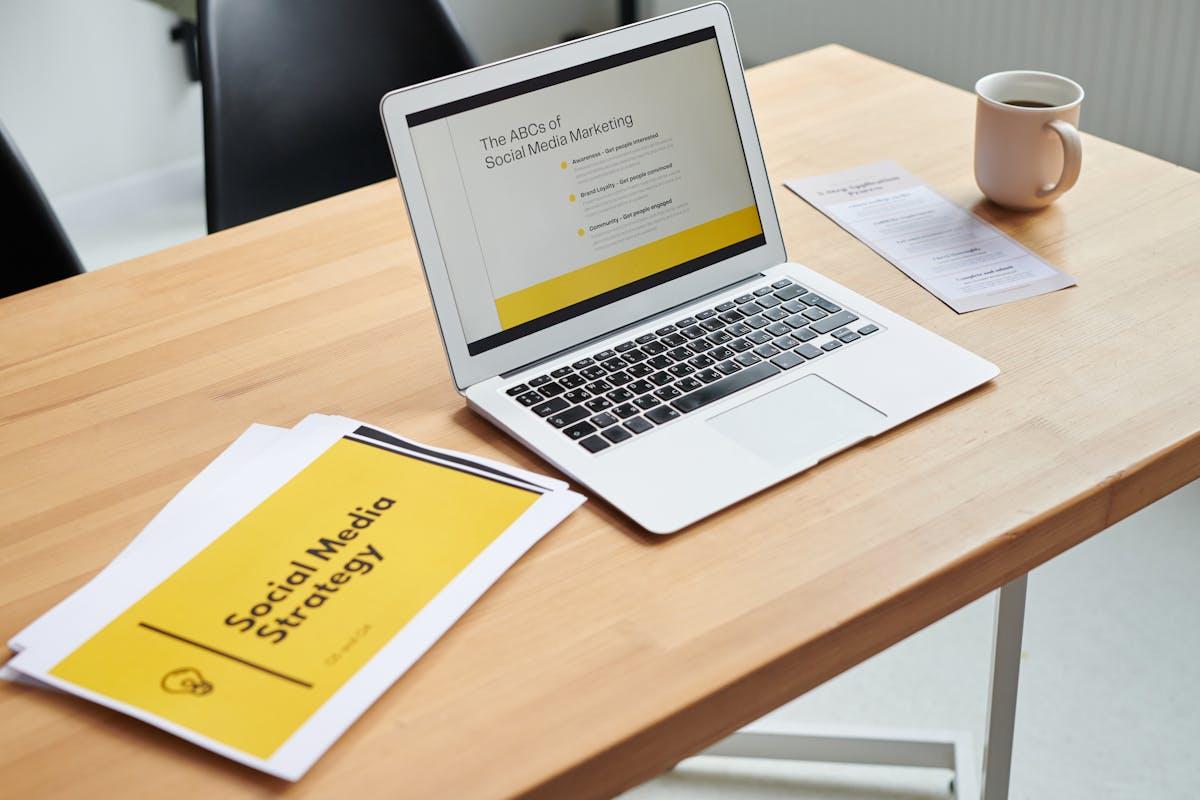 Close-up of laptop displaying a social media marketing strategy