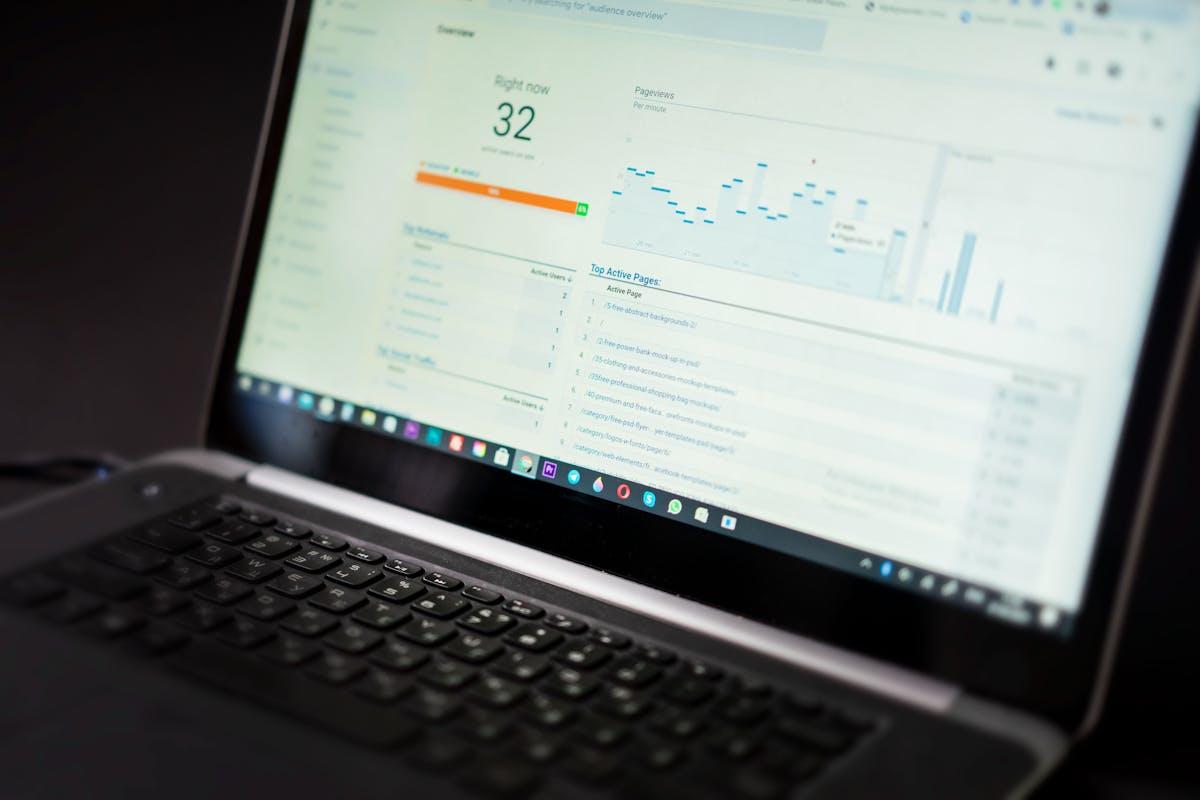 Laptop displaying social media analytics dashboard with real-time data