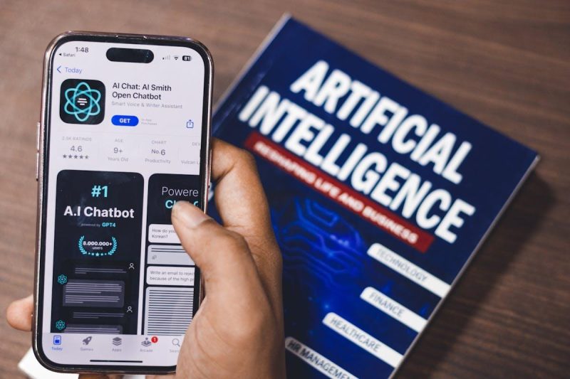 Smartphone displaying AI app surrounded by data and technology