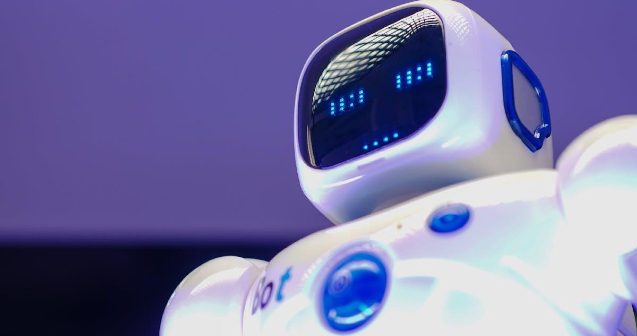 Modern humanoid robot with digital face symbolizing AI-powered trend prediction technology