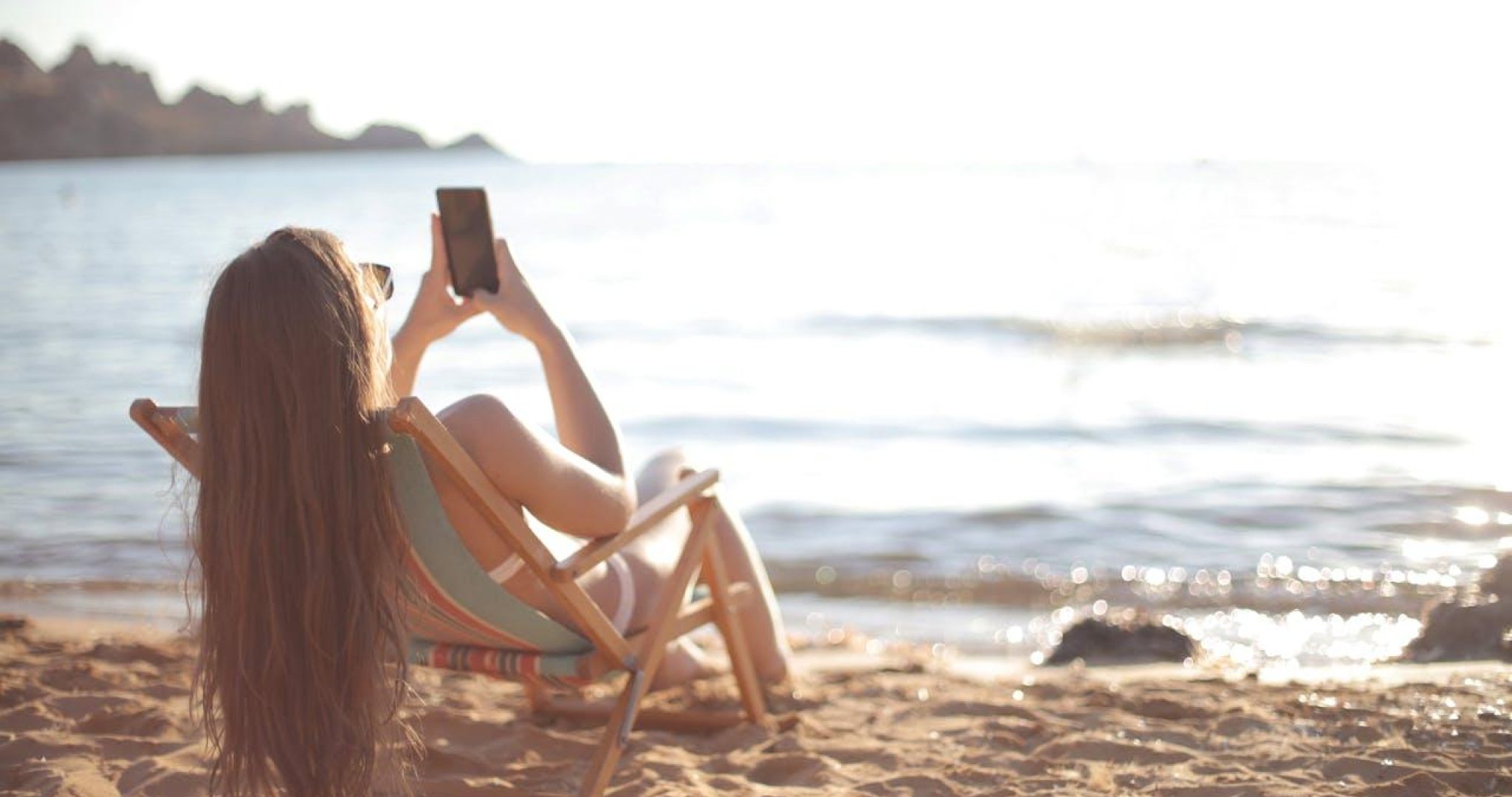 Gospa na dopustu na plazi