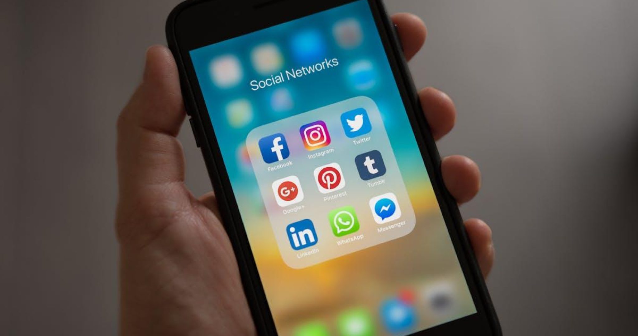 Person setting up social media account on phone