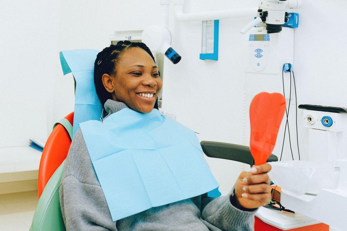 Smiling patient after dental check-up