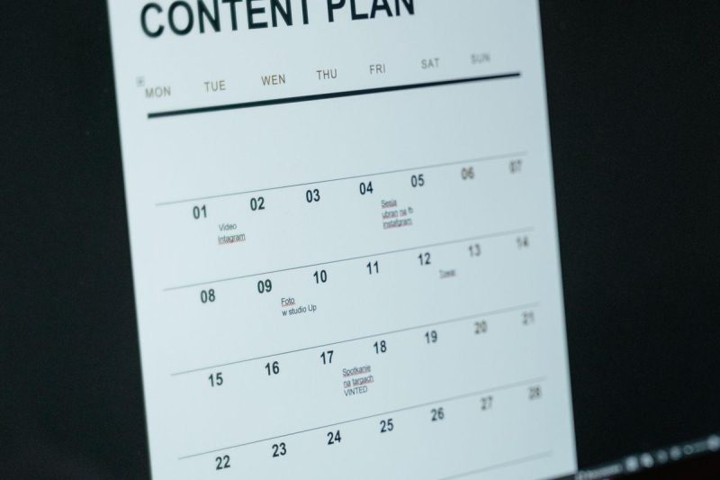 Close-up of a digital content calendar on a laptop screen, representing social media planning and scheduling