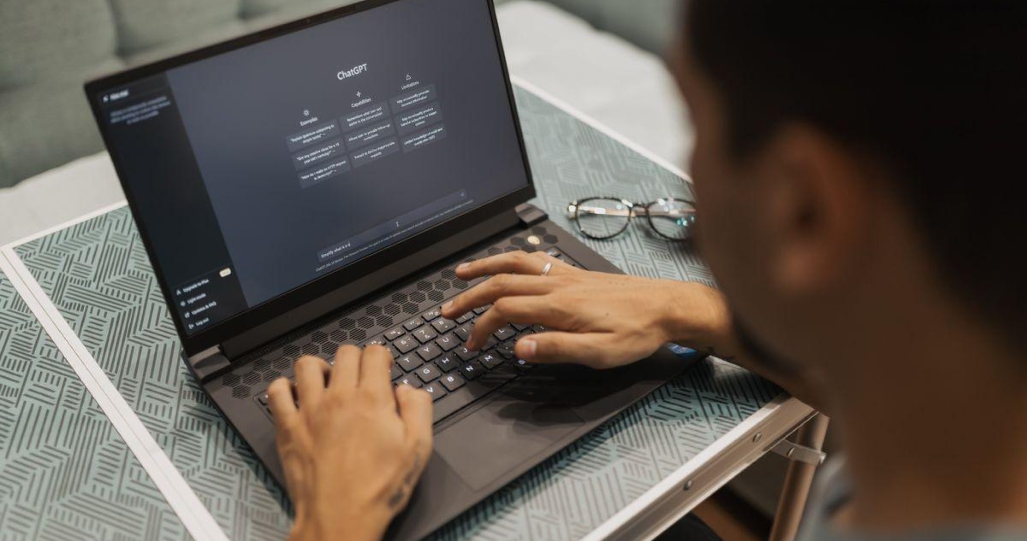Person using a laptop to interact with AI technology, representing MCP server integration