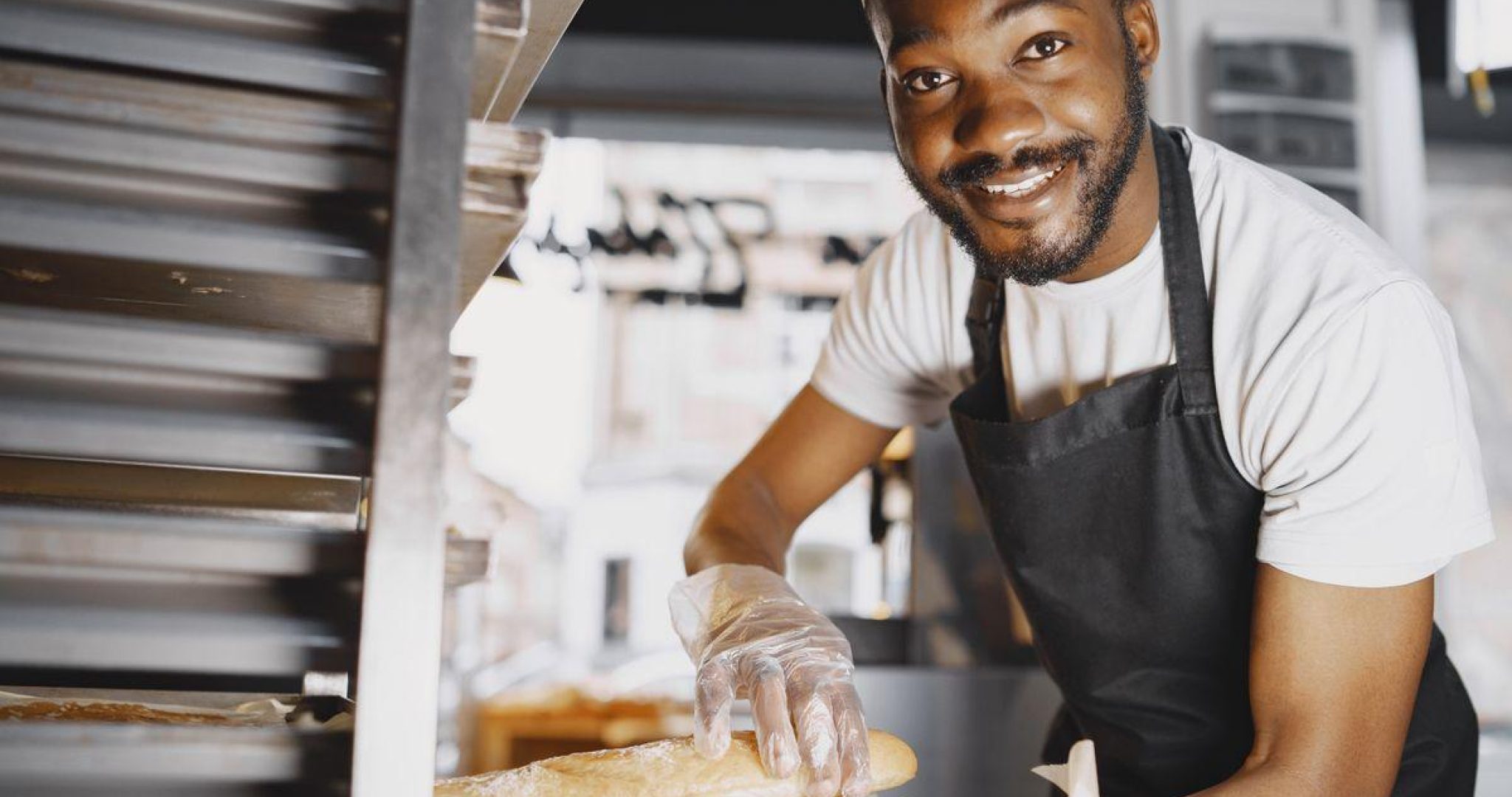 Artisan baker shaping bread dough