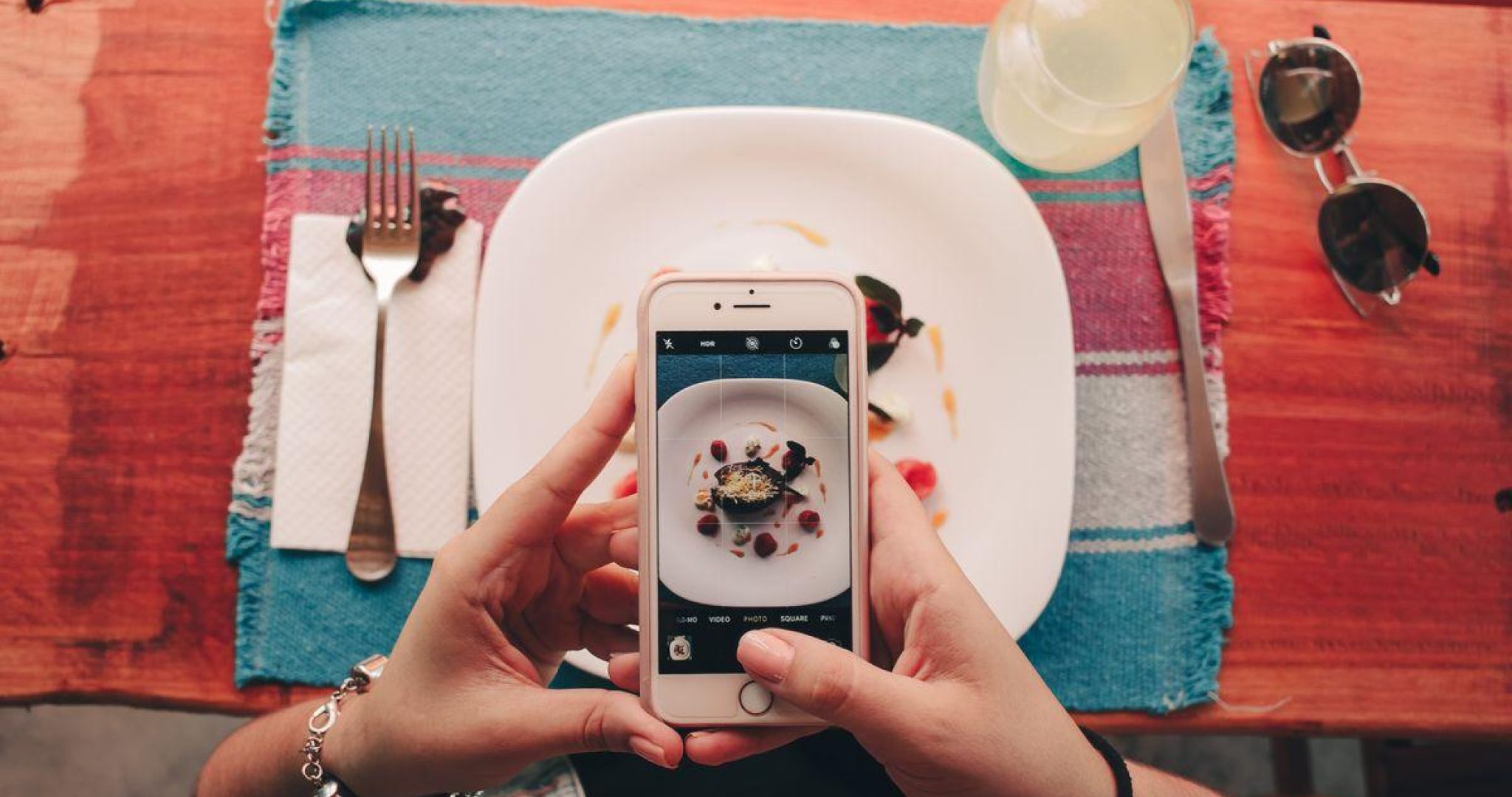 Overhead shot of beautifully arranged restaurant dishes on a table